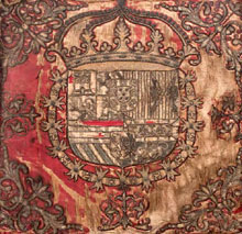 Anvers del banderí o guió brodat de Santa Pau de l'església de Santa Maria dels Arcs de Santa Pau, amb l'escut de la casa d'Àustria